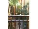 Lush courtyard view with tropical plants and manicured gardens at 12527 Floridays Resort Dr # 603E, Orlando, FL 32821