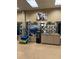 Bright gym area with fitness accessories and water and towel station at 12527 Floridays Resort Dr # 603E, Orlando, FL 32821