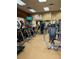 Comfortable gym with modern machines and mounted televisions for entertainment at 12527 Floridays Resort Dr # 603E, Orlando, FL 32821