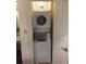 Convenient stacked washer and dryer unit, maximizing space and functionality at 12527 Floridays Resort Dr # 603E, Orlando, FL 32821
