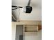 Spacious garage featuring a LiftMaster garage door opener, screens and built-in storage shelves at 1819 E Chapel Dr, Deltona, FL 32738