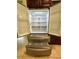 Stainless steel refrigerator with French doors and pull out freezer drawers at 1819 E Chapel Dr, Deltona, FL 32738