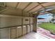 Interior view of a shed with tile floors and custom built in shelving at 1819 E Chapel Dr, Deltona, FL 32738