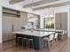 Eat-in kitchen with double islands, stainless appliances, and lots of natural light at 9508 Sloane St, Orlando, FL 32827