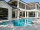 Backyard with large inground pool and patio for entertaining at 9508 Sloane St, Orlando, FL 32827
