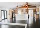 Open kitchen design with breakfast bar, stainless appliances, and hardwood floors at 132 Alachua Dr, Winter Haven, FL 33884