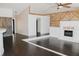 Spacious living room featuring hardwood floors, a fireplace, and an open layout at 132 Alachua Dr, Winter Haven, FL 33884