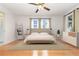 Serene bedroom with neutral tones, hardwood floors, and ample natural light at 1432 Meadowlark Dr, Deltona, FL 32725