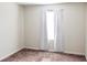 A bedroom featuring neutral carpet, a window with curtains, and electrical outlets at 184 Lake Smart Cir, Winter Haven, FL 33881