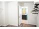 View from a bedroom doorway into an ensuite bathroom with shower and vanity at 184 Lake Smart Cir, Winter Haven, FL 33881