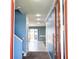 Bright entryway with tile flooring, recessed lighting, and a staircase, leading into an open-concept living space at 184 Lake Smart Cir, Winter Haven, FL 33881