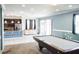 Well-lit game room featuring a pool table and bar area, perfect for entertaining guests at 184 Lake Smart Cir, Winter Haven, FL 33881