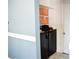 Interior area with custom shelving and dark cabinets at 184 Lake Smart Cir, Winter Haven, FL 33881