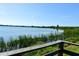 Scenic lake view from community boardwalk at 184 Lake Smart Cir, Winter Haven, FL 33881