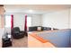 Cozy upstairs living area with plush seating and ample natural light at 184 Lake Smart Cir, Winter Haven, FL 33881