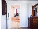 Bedroom featuring neutral carpet, furniture, and a doorway leading to another room at 184 Lake Smart Cir, Winter Haven, FL 33881