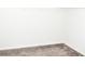 Empty walk-in closet featuring beige carpet flooring and white walls at 184 Lake Smart Cir, Winter Haven, FL 33881