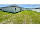 Spacious backyard featuring a green lawn and a full perimeter fence at 4295 Nw 1St Court Rd, Ocala, FL 34475