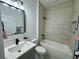 Bathroom with shower and tub combination and vanity with neutral walls at 4295 Nw 1St Court Rd, Ocala, FL 34475