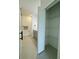 Modern bathroom showing double-sink vanity, toilet, and closet with barn door at 4295 Nw 1St Court Rd, Ocala, FL 34475