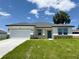 Charming single-story home with well-manicured lawn, stone accents, and a two car garage at 4295 Nw 1St Court Rd, Ocala, FL 34475