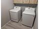 Well-lit laundry room with LG washer and dryer at 490 Burnt Tree Ln, Apopka, FL 32712