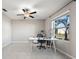Spacious office space with ample natural light, featuring tile flooring and a ceiling fan at 5553 Turkey Creek Way, Lakeland, FL 33811