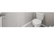 Close-up of an installed toilet with a white seat and lid, ready for use at 5553 Turkey Creek Way, Lakeland, FL 33811