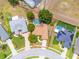 An aerial view showcases a home with a screened-in pool and well-maintained yard enclosed by a red boundary line at 8023 Canyon Lake Cir, Orlando, FL 32835