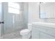 Bathroom featuring a glass-enclosed shower, updated vanity, and modern fixtures at 8023 Canyon Lake Cir, Orlando, FL 32835