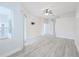 Bedroom features bright lighting, a ceiling fan, and an outdoor view at 8023 Canyon Lake Cir, Orlando, FL 32835