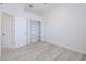 Bedroom featuring a closet with shelving and lots of natural light from the windows at 8023 Canyon Lake Cir, Orlando, FL 32835
