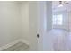 View into closet with gray wood floors at 8023 Canyon Lake Cir, Orlando, FL 32835