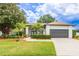 Charming single-Gathering home with lush landscaping and a well-manicured lawn at 8023 Canyon Lake Cir, Orlando, FL 32835