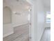 View of a bright and open living room with gray wood floors at 8023 Canyon Lake Cir, Orlando, FL 32835