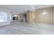 Bright open-concept living space with modern accents including a fireplace and kitchen at 8023 Canyon Lake Cir, Orlando, FL 32835