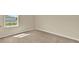 Bedroom with carpet, a window, and ample natural light at 1076 Clay Blvd, Tavares, FL 32778