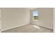 Neutral bedroom with carpet, natural light, and ample space at 1076 Clay Blvd, Tavares, FL 32778