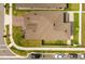 An aerial shot capturing the roof, lawn, walkway, and driveway of a well-maintained home at 1103 Silo Dr, St Cloud, FL 34771