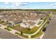 Two-story home featuring a brick driveway, white fence, well-manicured lawn, and situated on a corner lot at 1103 Silo Dr, St Cloud, FL 34771