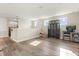 Spacious loft area with lots of light, offering flexible living space and wood-look floors at 1103 Silo Dr, St Cloud, FL 34771