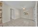 Open living area with tiled floors and bright window with outside view at 1111 Lynx Trl, Winter Springs, FL 32708