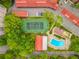Aerial view of tennis courts, pool, and community buildings at 1150 Carmel Cir # 301, Casselberry, FL 32707