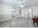 Spacious bedroom with ensuite bath, ceiling fan, and tile floors at 1150 Carmel Cir # 301, Casselberry, FL 32707