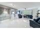 Bright living room with modern decor, sleek furniture, and a view of the outdoors at 1150 Carmel Cir # 301, Casselberry, FL 32707