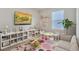 Playful bedroom with colorful decor and ample storage at 1266 Limbali St, Mount Dora, FL 32757