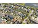 Aerial view showcasing neighborhood featuring the lake and community at 14720 Sweet Acacia Dr, Orlando, FL 32828