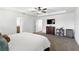 Spacious bedroom with ceiling fan, walk-in closet, and neutral carpeting at 1558 Terra Verde Way, Ocoee, FL 34761