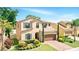 Charming home with manicured landscaping and two-car garage at 1558 Terra Verde Way, Ocoee, FL 34761