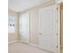 Bedroom featuring two doors and one window at 15698 Marina Bay Dr, Winter Garden, FL 34787
